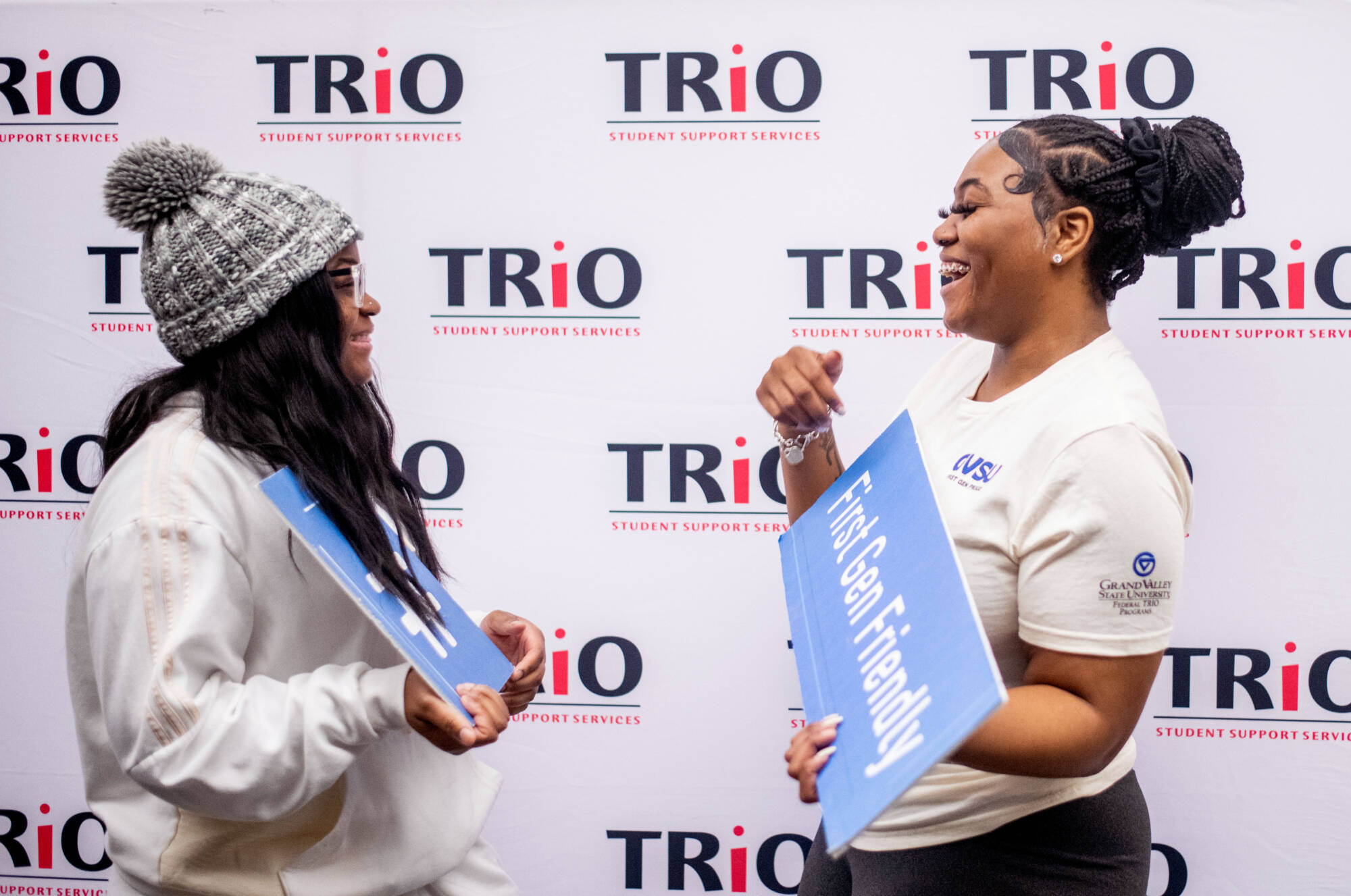 Grand Valley first-generation students Cierra Hatcher, left, and Talaya Smith laugh together during a first-generation student celebration at the Cook-DeWitt Center November 8.